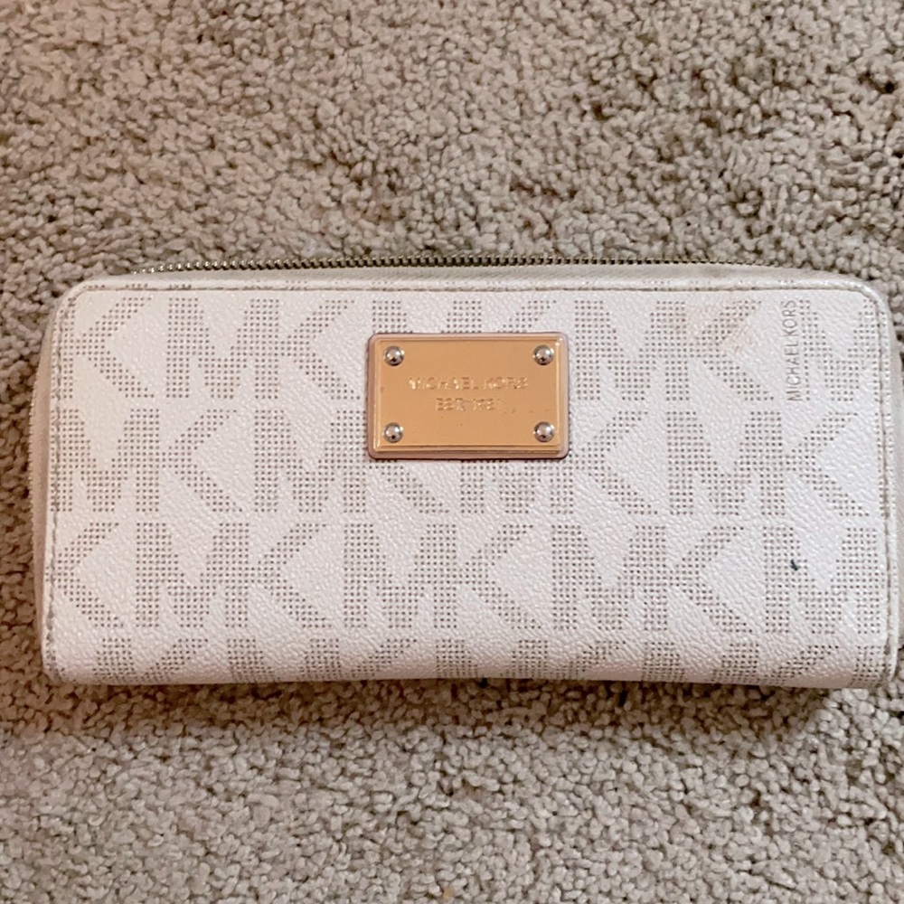Slightly used white Michael Kors wallet